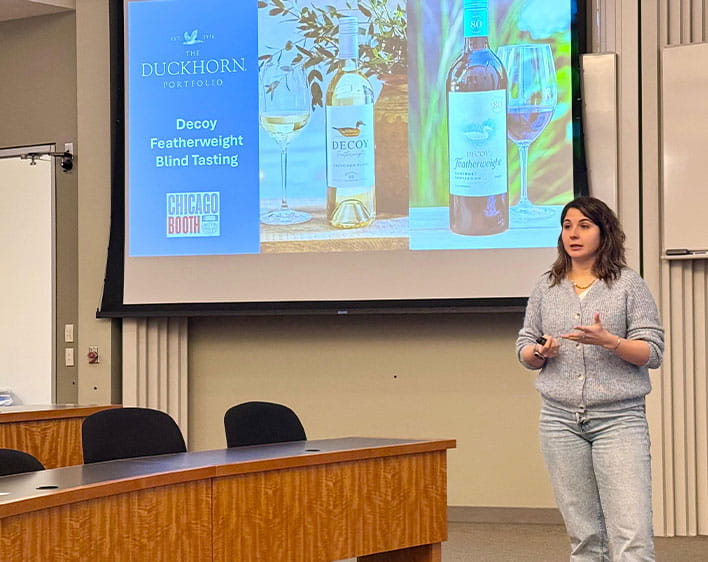 Nehir giving presentation on wine in classroom