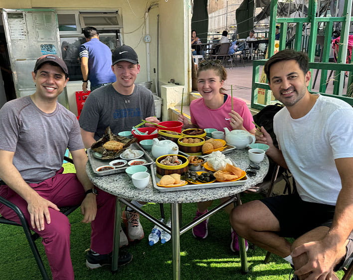 Sharan Chawla eating meal with friends outside