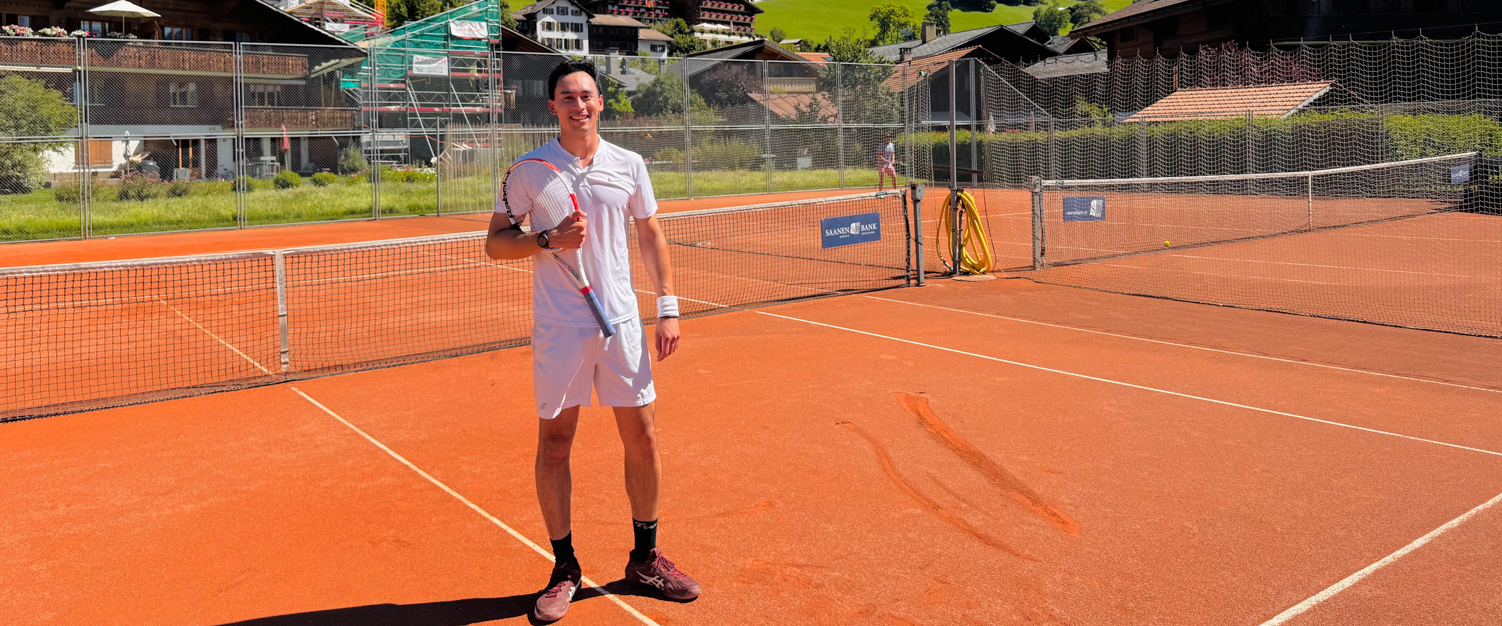 Evan Nguyen playing tennis