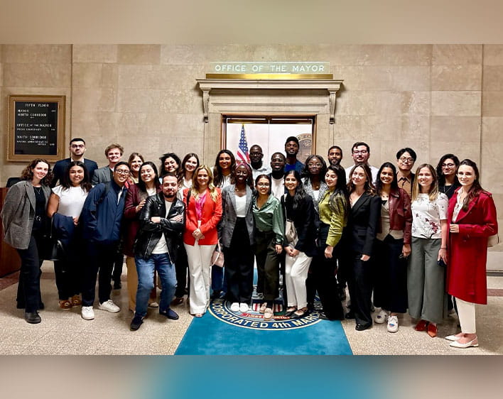 Large group, including Hashaam Asif, at the City of Chicago's mayors office