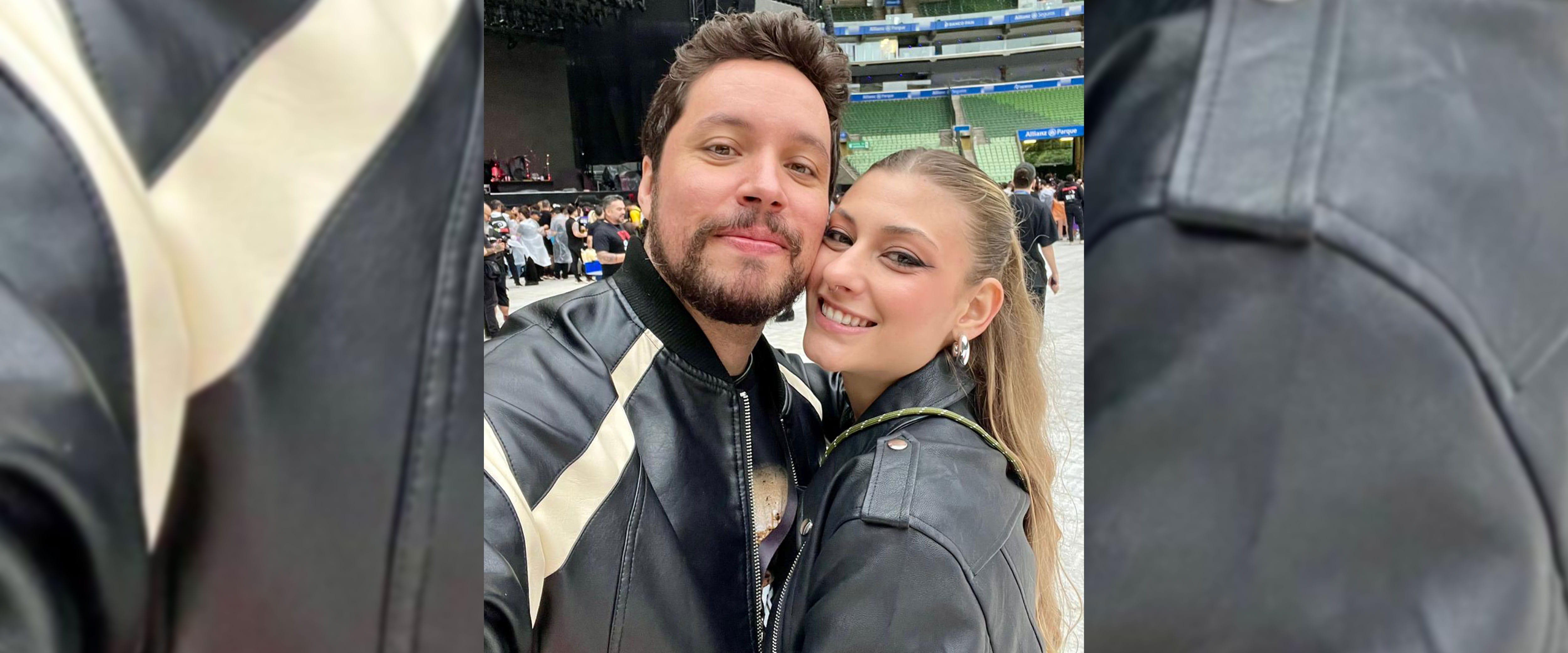 selfie of Caio with his wife at concert