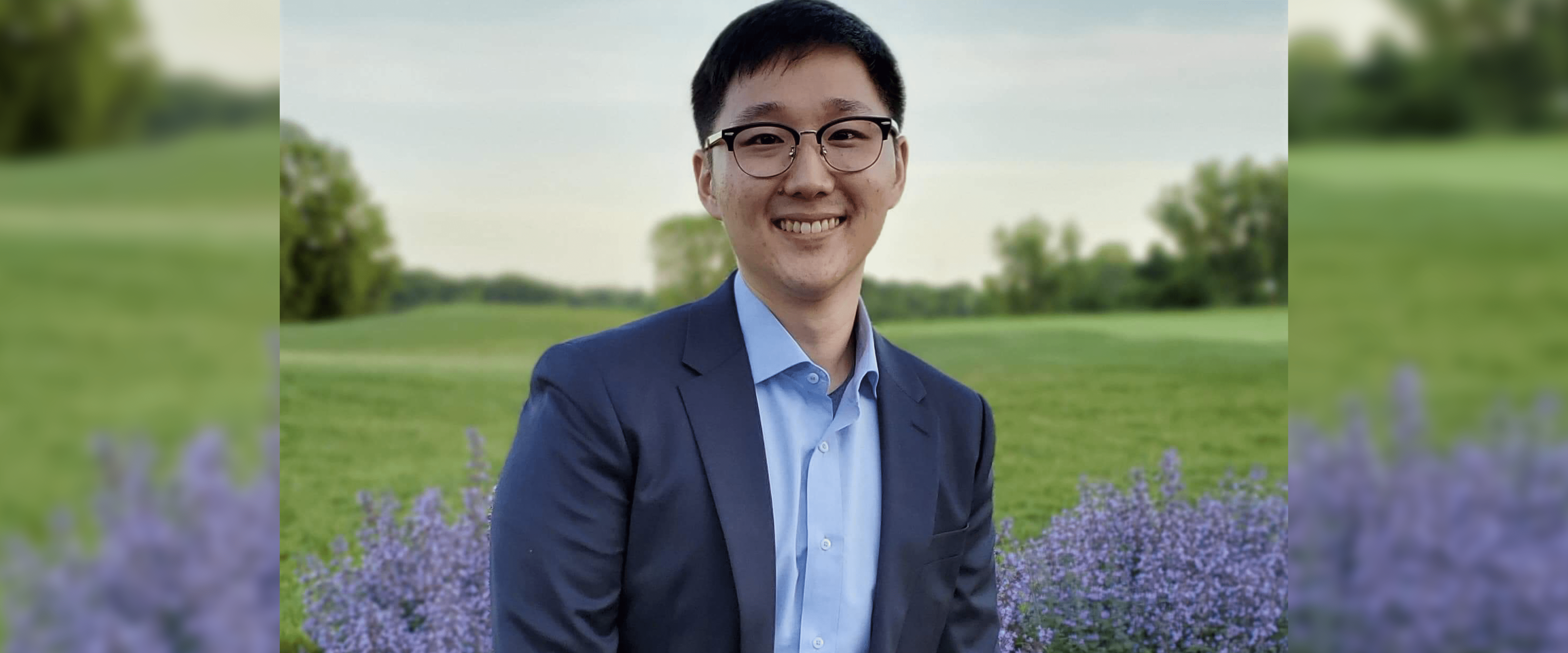 David Kim headshot with blurred background