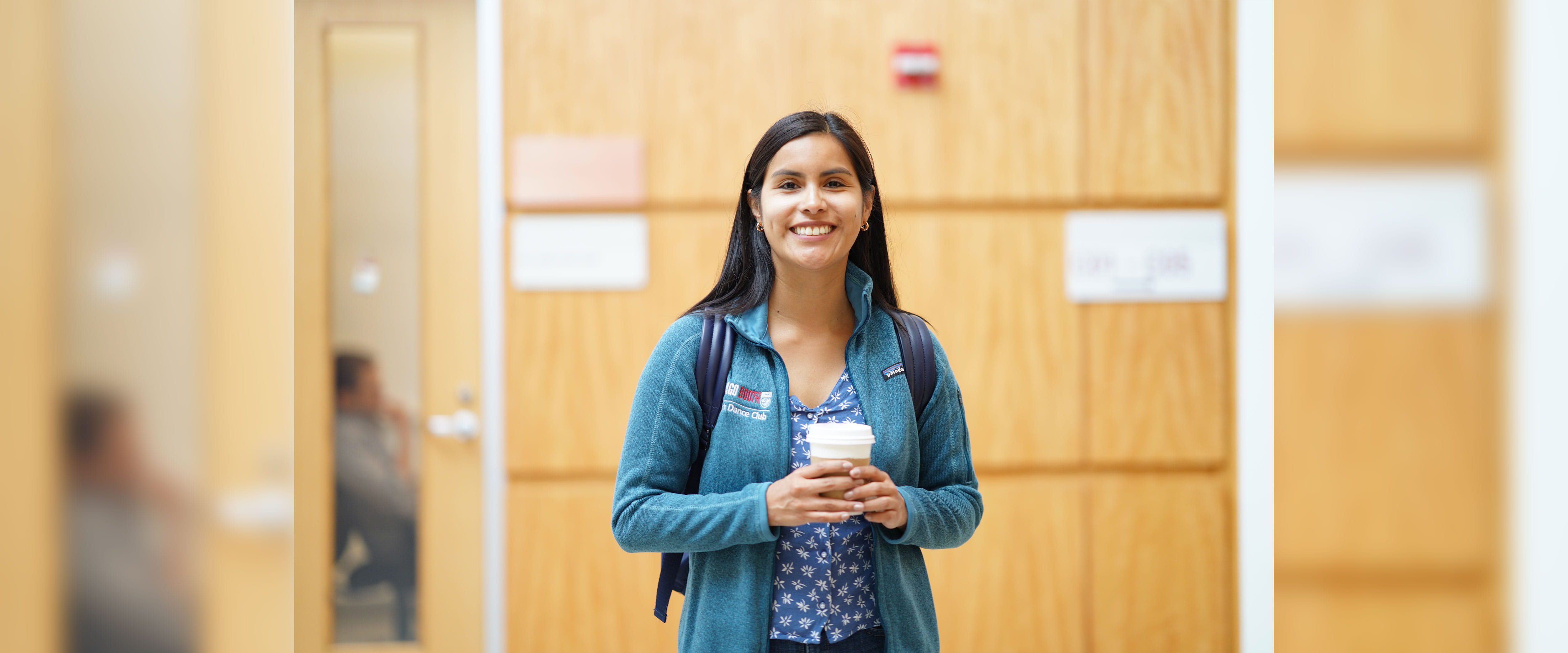 Boothie smiling in Booth gear