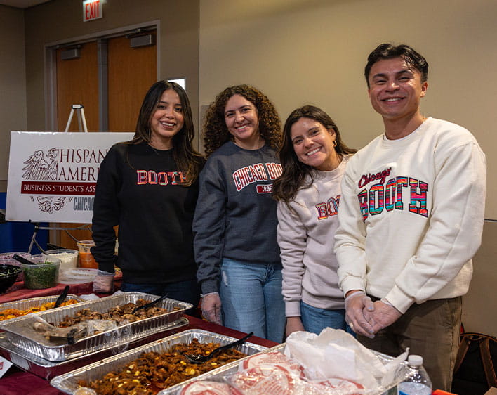 Selena Lopez and three other Boothies tabling HABSA event with food