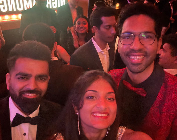 selfie of Tanvi Gopalabhatla and other Boothies at formal event
