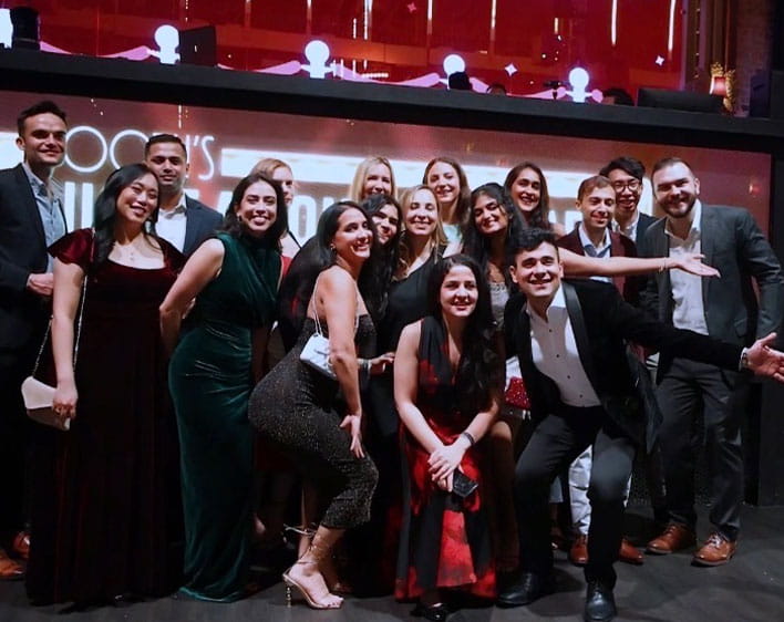 Tanvi Gopalabhatla and friends in formal wear smiling