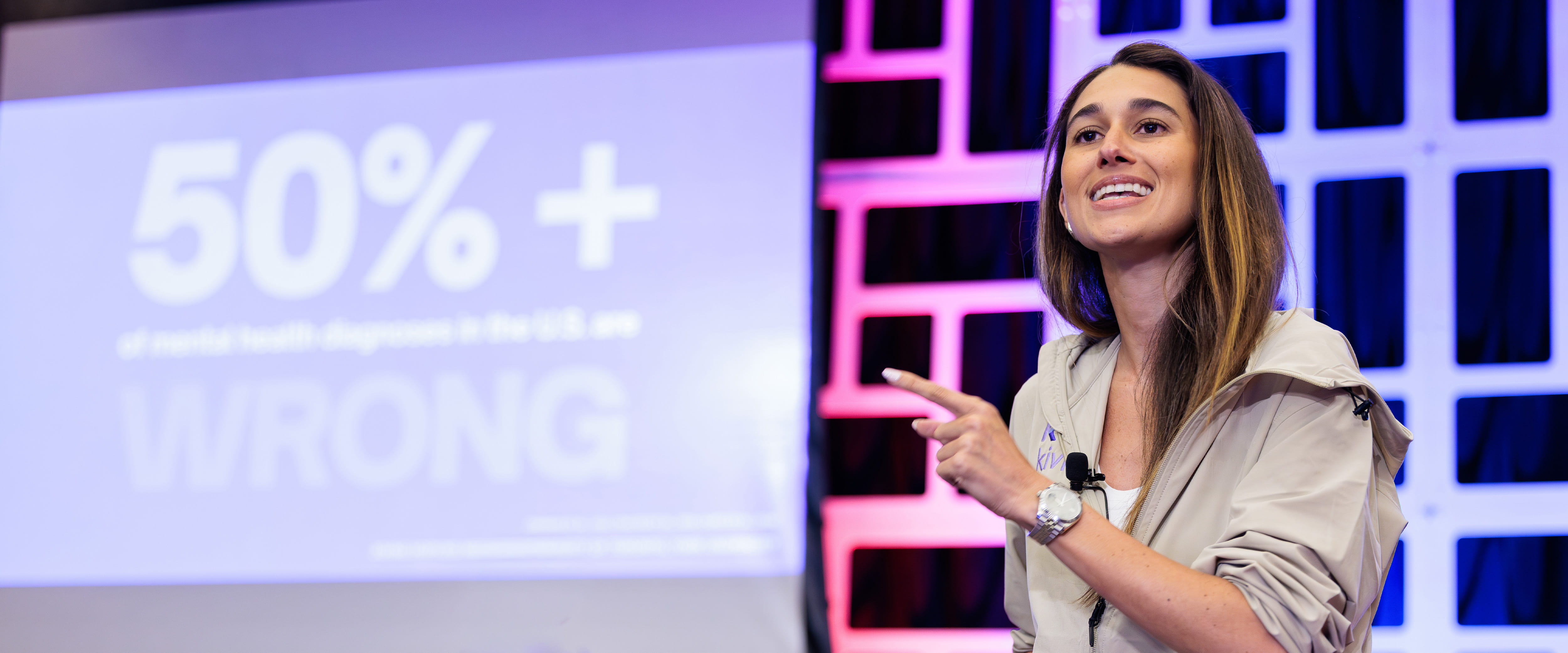 Maria Carmona on stage presenting 