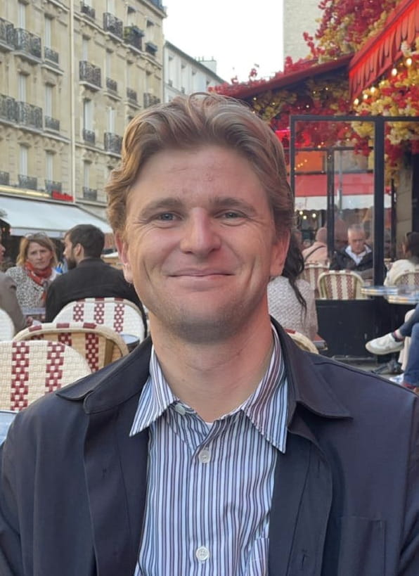 Jake Embrey headshot