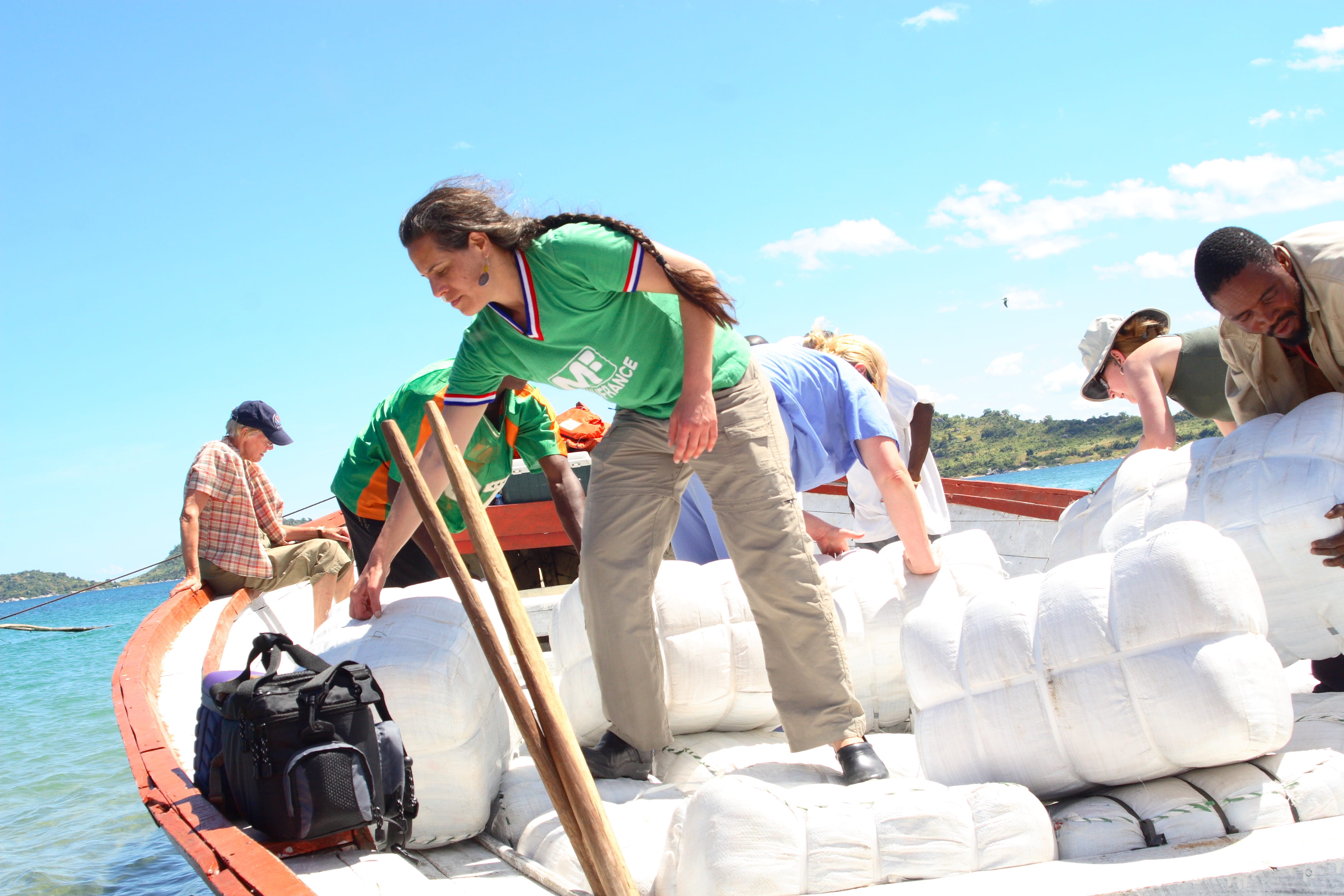 Dr. Amy Lehman on a boat in DRC