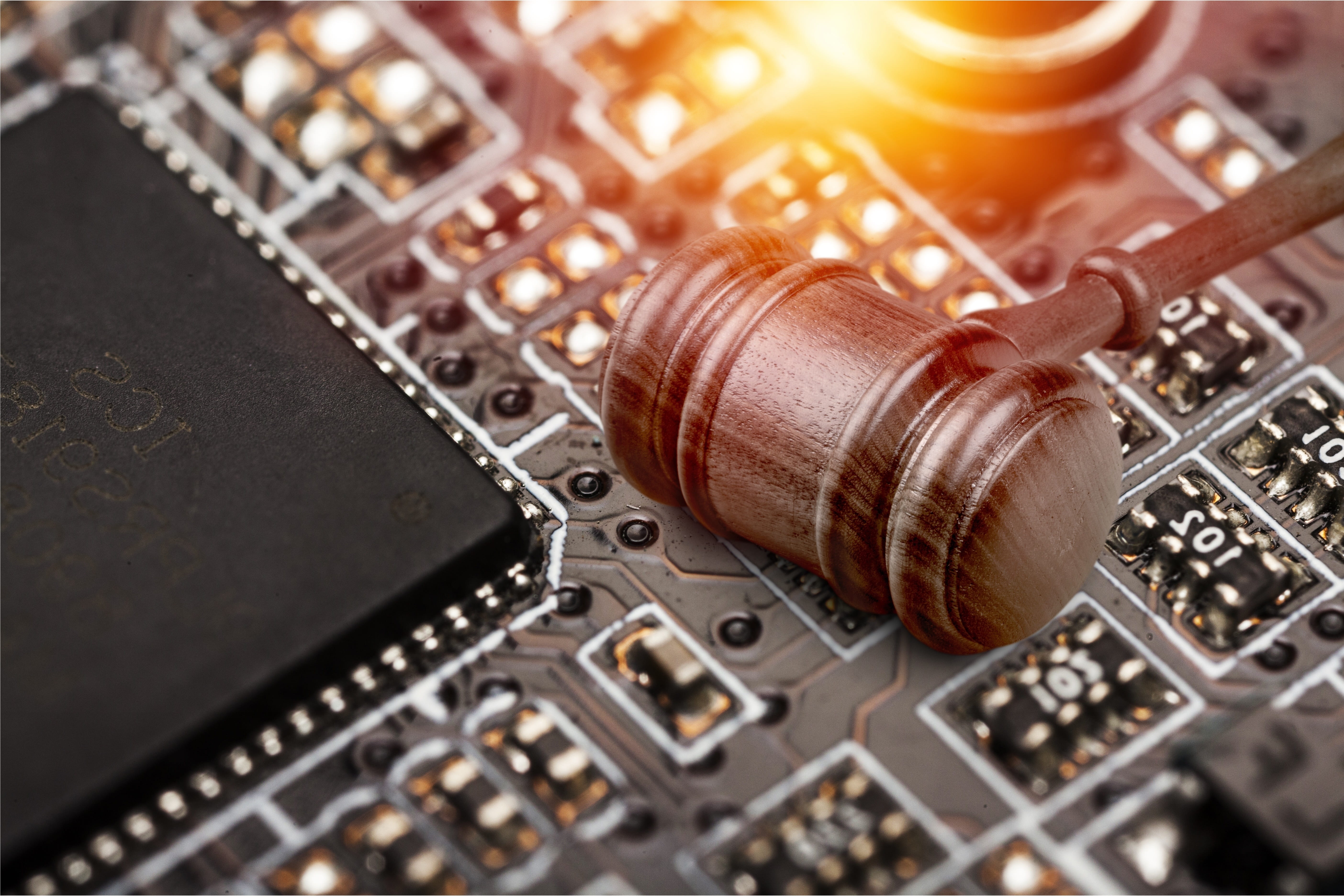 Gavel on a computer chip