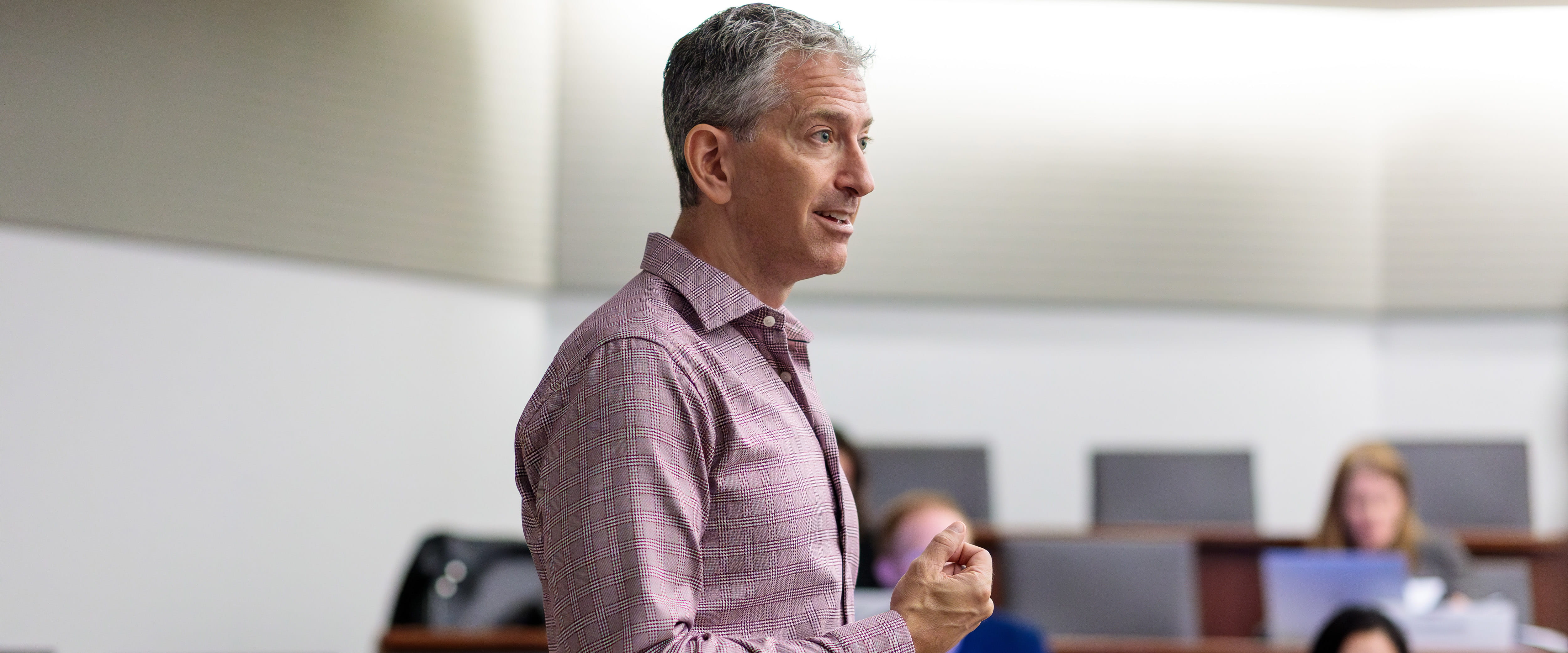 Professor Jean-Pierre Dubé teaching in class